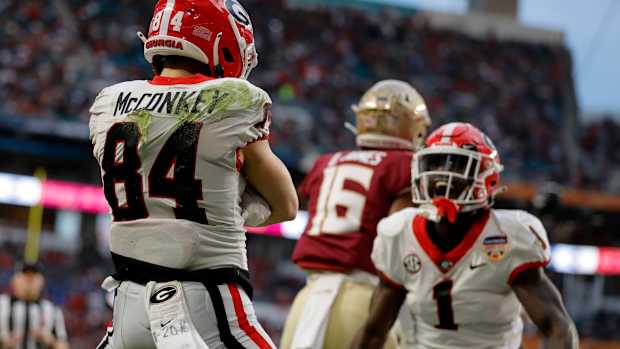 Dec 30, 2023; Miami Gardens, FL, USA; Georgia Bulldogs wide receiver Ladd McConkey (84) reacts after scoring a touchdown against the Florida State Seminoles during the first half in the 2023 Orange Bowl at Hard Rock Stadium. Mandatory Credit: Sam Navarro-USA TODAY Sports  